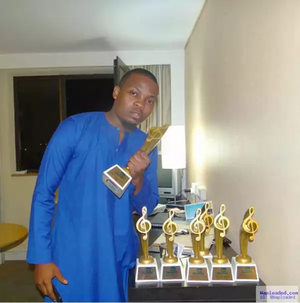 Photos: Olamide Poses With His 7 Tooxclusive Awards